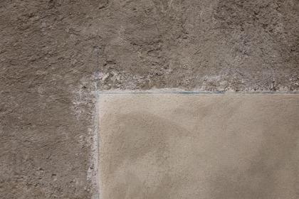 Sample showing finish stucco against rough coat